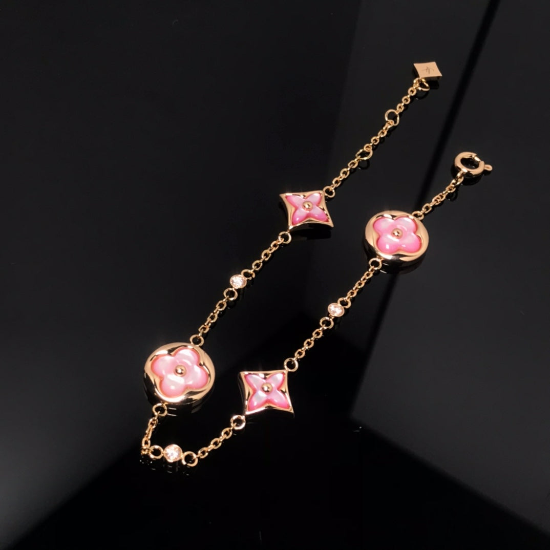 [LUXE]Armband aus rosa Gold mit Stern- und Sonnenmotiv, 4 Motive 