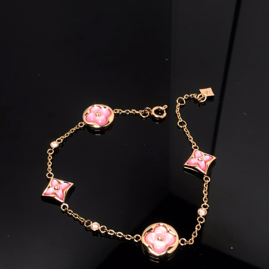 [LUXE]Armband aus rosa Gold mit Stern- und Sonnenmotiv, 4 Motive 