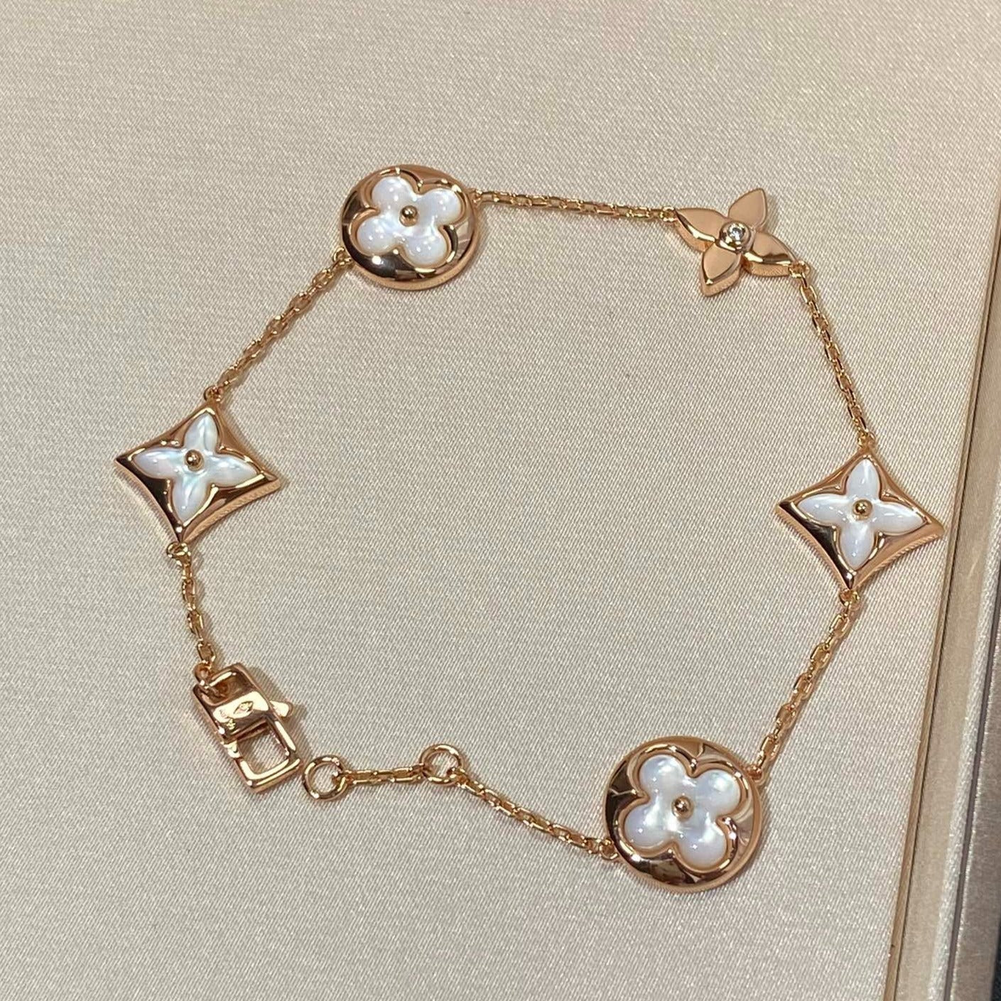 [ROYAL]STAR AND SUN 5 MOTIF MOP PINK GOLD BRACELET