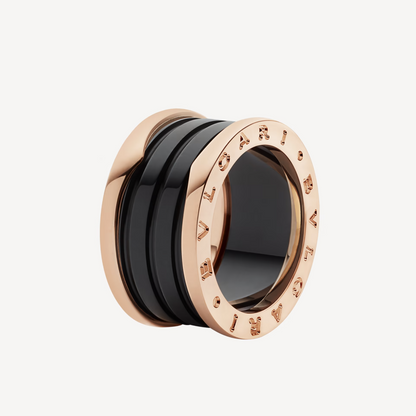 [LUXE]ZERO 1 RING AUS ROTGOLD MIT VIER BÄNDERN UND SCHWARZER KERAMIK-SPIRALE