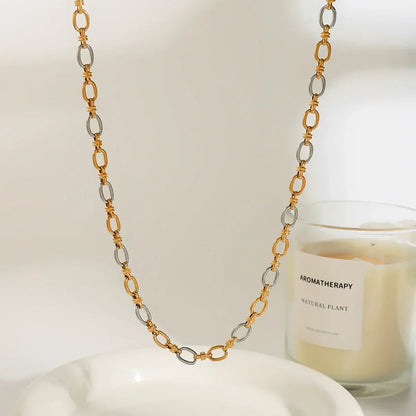 {
  "[Royal&Vicky]Addison Two Tone Gold Necklace": "[Royal&Vicky] アディソン ツートーン ゴールドネックレス"
}