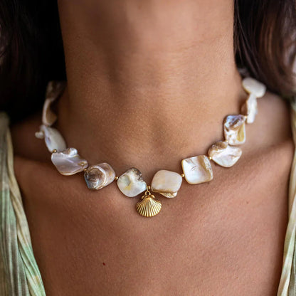 {
  "[Royal&Vicky]Aquamarine Seashell Necklace": "[Royal&Vicky] アクアマリン・シーシェルネックレス"
}